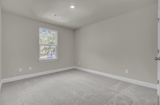 5629 Ellington School Rd, Ravenel, SC 29470 - spare room with light carpet, baseboards, and recessed lighting