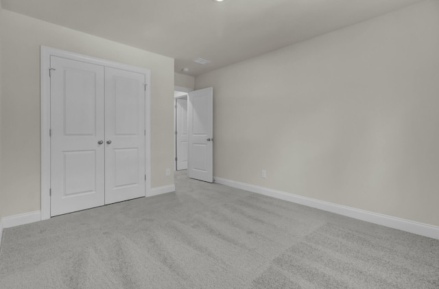 5629 Ellington School Rd, Ravenel, SC 29470 - unfurnished bedroom featuring carpet, a closet, and baseboards
