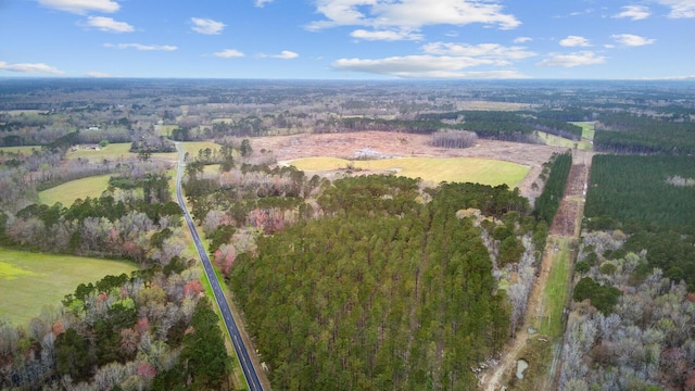 aerial view featuring a view of trees