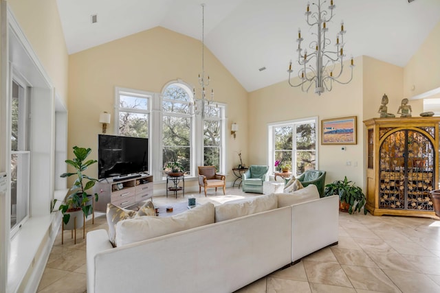 living room with a chandelier, visible vents, high vaulted ceiling, and light tile patterned flooring