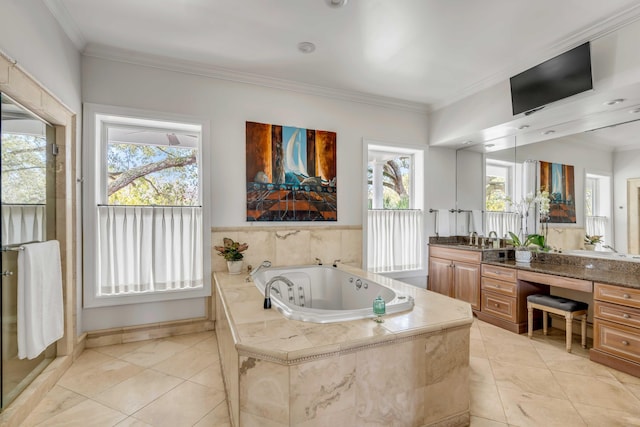 full bath featuring a whirlpool tub, ornamental molding, vanity, and tile patterned floors