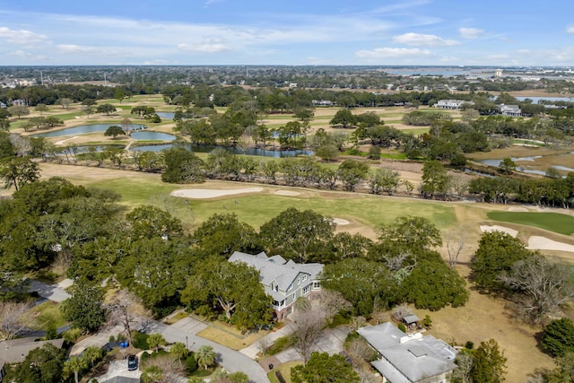 bird's eye view featuring view of golf course and a water view