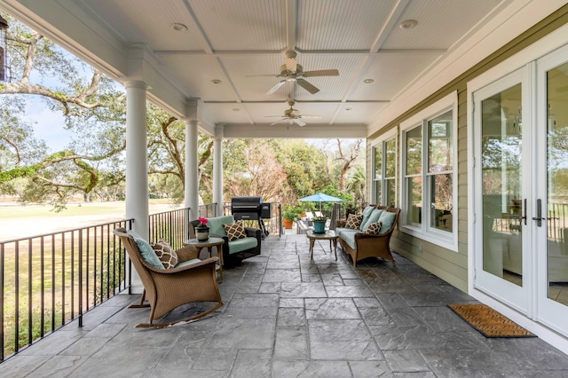 exterior space featuring ceiling fan, an outdoor hangout area, and french doors