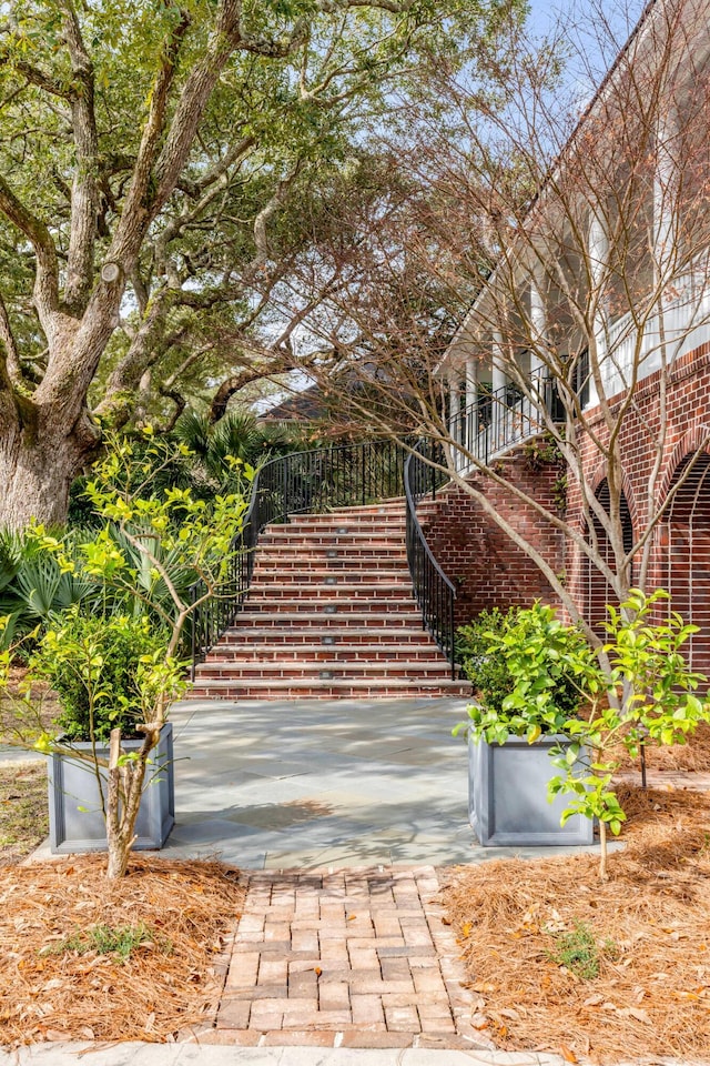 view of property's community featuring stairway