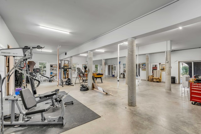 workout area with ornate columns