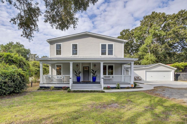 view of front of property featuring a front yard, an outdoor structure, a porch, and a garage