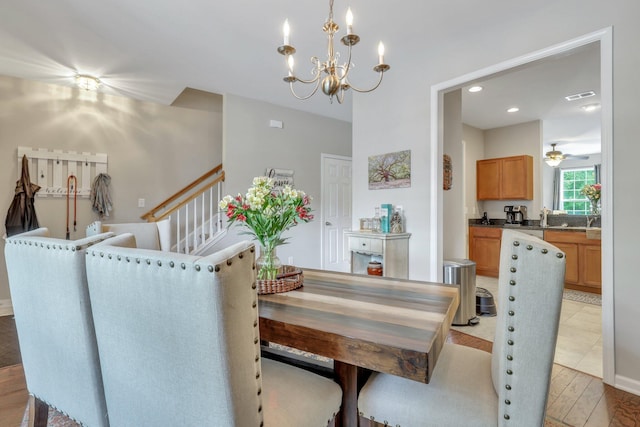 dining room with visible vents, a chandelier, stairway, light wood-style flooring, and recessed lighting