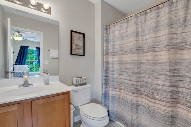 full bathroom featuring visible vents, toilet, and vanity