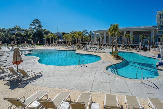 view of pool featuring a patio