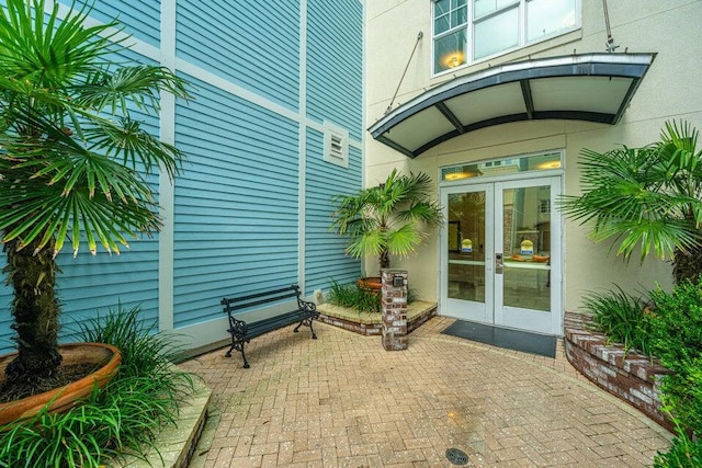 view of patio featuring french doors