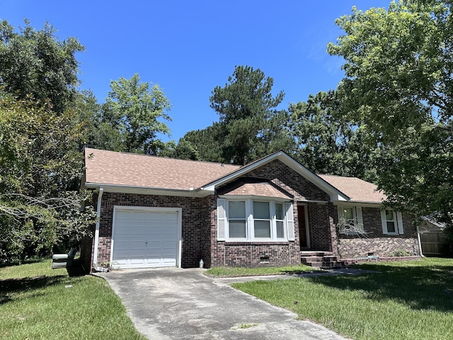 single story home with a garage and a front lawn