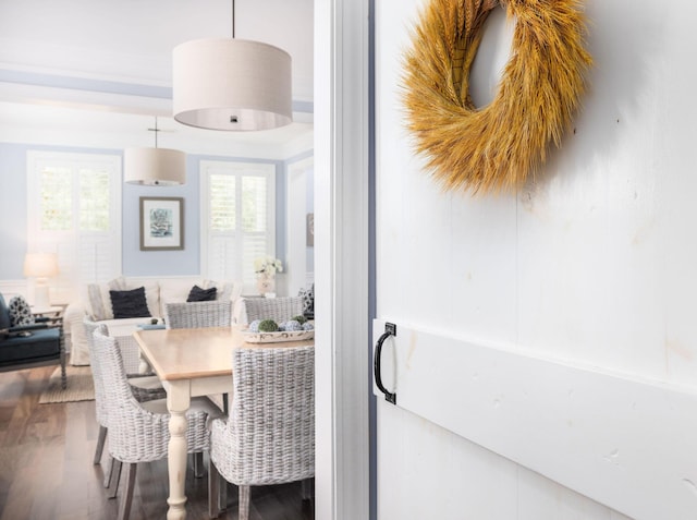 dining area with hardwood / wood-style floors