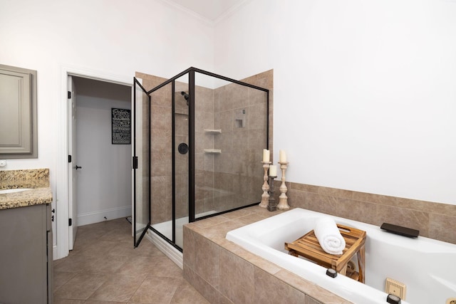 bathroom with tile patterned floors, vanity, crown molding, and plus walk in shower