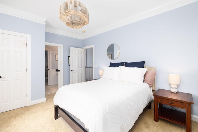 carpeted bedroom featuring crown molding