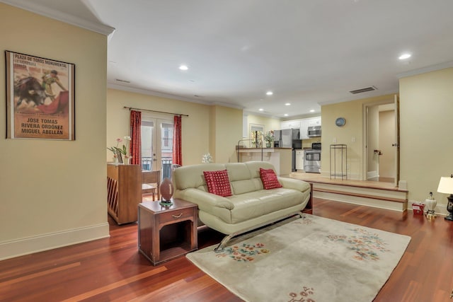 living room featuring dark wood-type flooring and crown molding