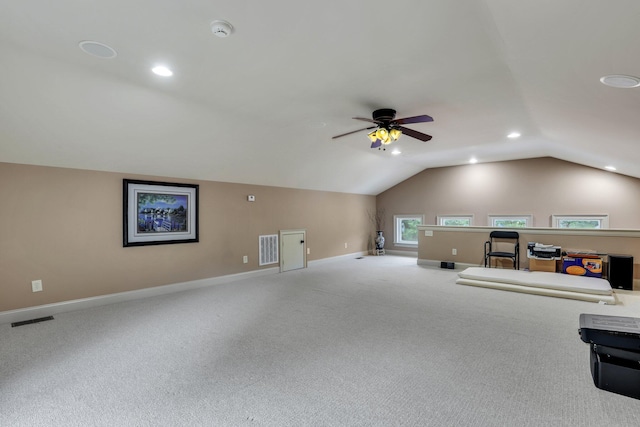 bonus room with lofted ceiling, ceiling fan, and carpet