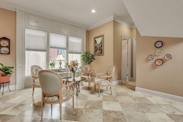 sitting room featuring crown molding