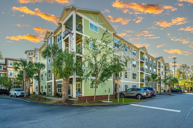 view of outdoor building at dusk