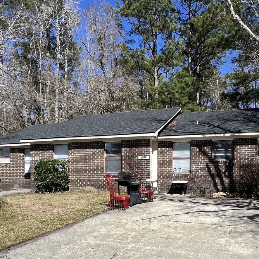 127 Woodduck Dr, Summerville, SC 29483 - view of front of property with brick siding, a patio, and roof with shingles