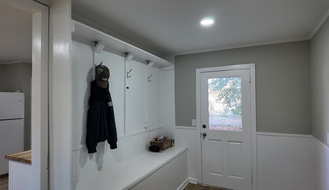 mudroom with hardwood / wood-style flooring and ornamental molding