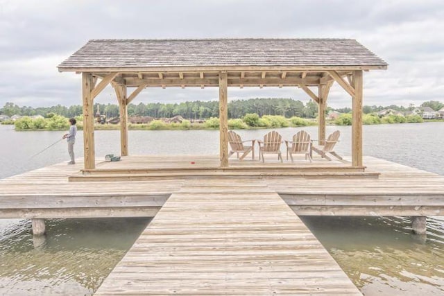 dock area featuring a water view