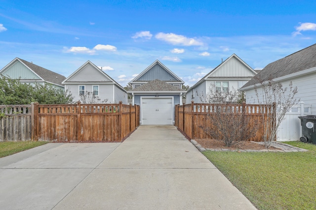 exterior space featuring a garage and a front lawn