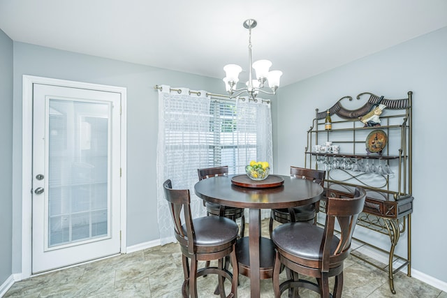 dining area with a chandelier