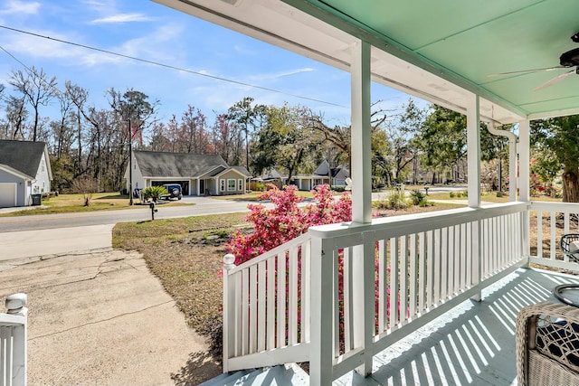 exterior space featuring covered porch and ceiling fan