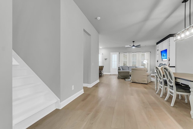 1017 Marsh Royal St, Summerville, SC 29485 - living room with light wood-style floors, a ceiling fan, and baseboards