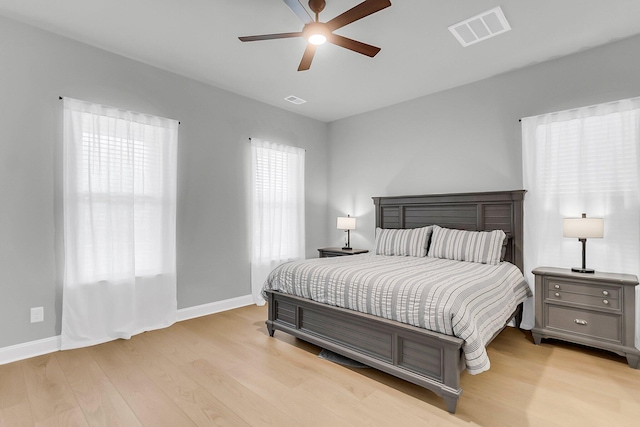 1017 Marsh Royal St, Summerville, SC 29485 - bedroom with light wood-style floors, baseboards, and ceiling fan