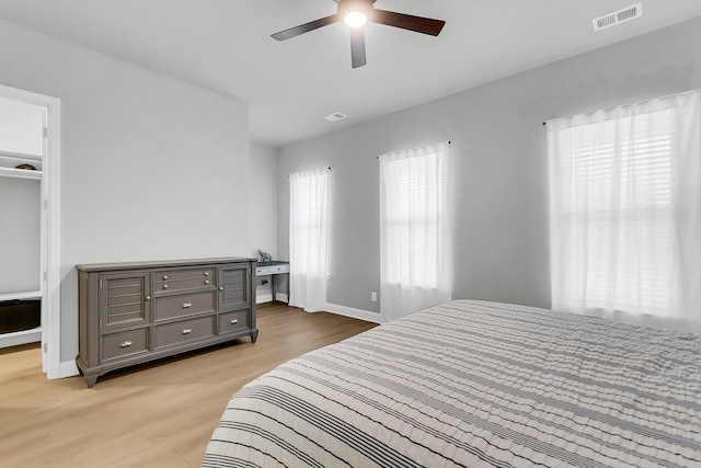1017 Marsh Royal St, Summerville, SC 29485 - bedroom with light wood-type flooring, baseboards, and ceiling fan