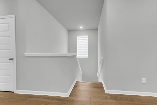 1017 Marsh Royal St, Summerville, SC 29485 - hallway featuring an upstairs landing, baseboards, wood finished floors, and recessed lighting