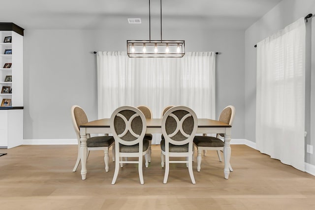 1017 Marsh Royal St, Summerville, SC 29485 - dining room featuring light wood-type flooring and baseboards