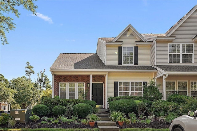 312 Kelsey Blvd, Wando, SC 29492 - traditional-style house with roof with shingles