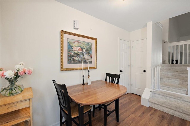 312 Kelsey Blvd, Wando, SC 29492 - dining space with stairs and wood finished floors