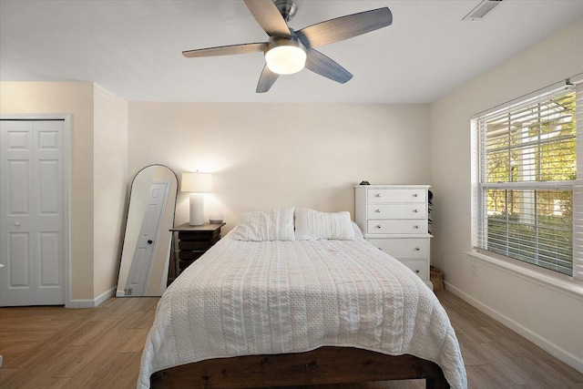 312 Kelsey Blvd, Wando, SC 29492 - bedroom featuring light wood-style flooring and a ceiling fan