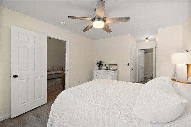 312 Kelsey Blvd, Wando, SC 29492 - bedroom with wood finished floors, ceiling fan, and ensuite bath