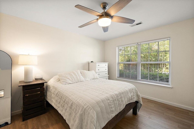 312 Kelsey Blvd, Wando, SC 29492 - bedroom with wood finished floors and a ceiling fan
