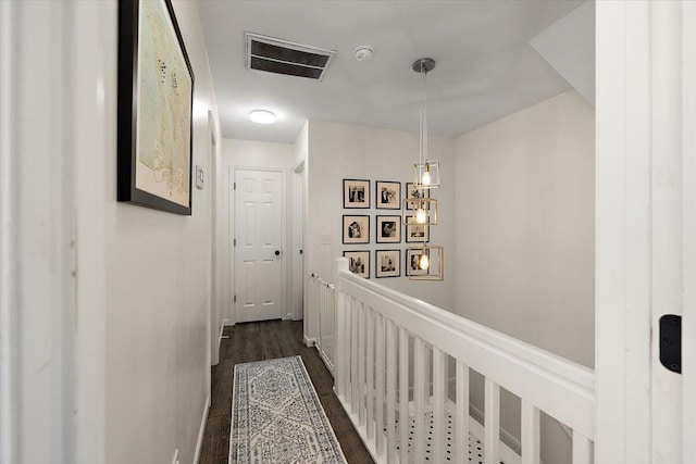 312 Kelsey Blvd, Wando, SC 29492 - corridor featuring an upstairs landing and dark wood-type flooring