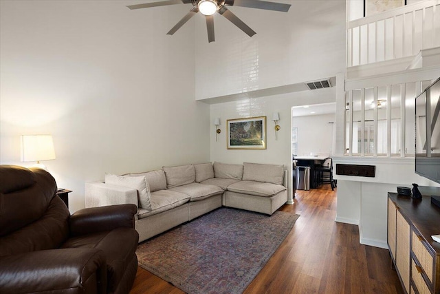 312 Kelsey Blvd, Wando, SC 29492 - living room with a ceiling fan, a high ceiling, and dark wood finished floors