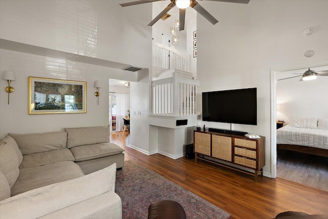 312 Kelsey Blvd, Wando, SC 29492 - living area featuring a ceiling fan, a towering ceiling, and wood finished floors