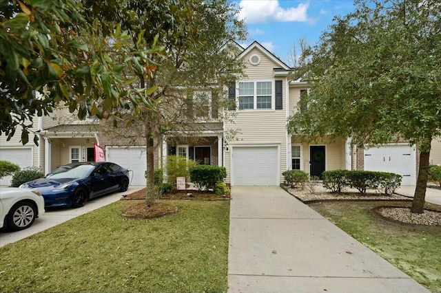 view of front of property featuring a garage and a front lawn