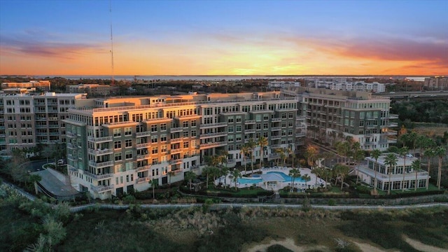 view of outdoor building at dusk