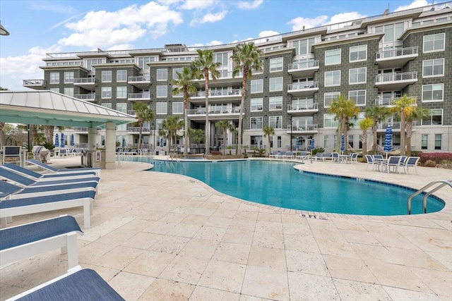 view of swimming pool featuring a gazebo and a patio area