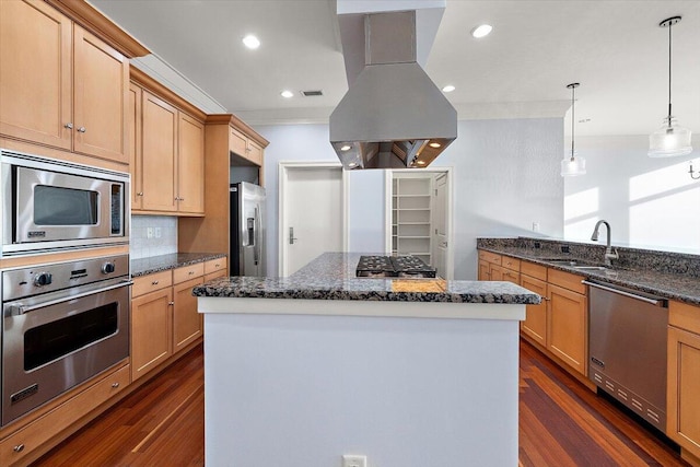 kitchen featuring sink, dark hardwood / wood-style floors, decorative light fixtures, island range hood, and appliances with stainless steel finishes