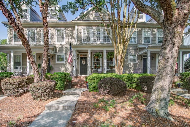 view of property with a porch