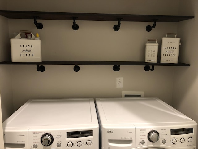 washroom with independent washer and dryer