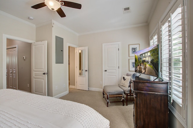 bedroom featuring light colored carpet, ornamental molding, electric panel, baseboards, and a ceiling fan