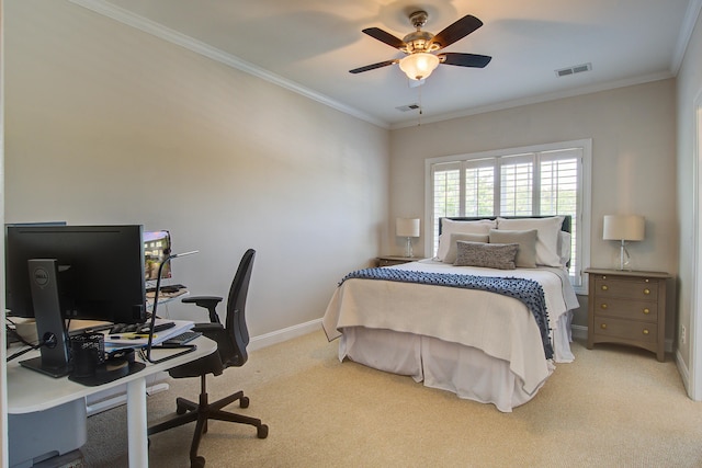 carpeted bedroom featuring a desk, baseboards, crown molding, and ceiling fan