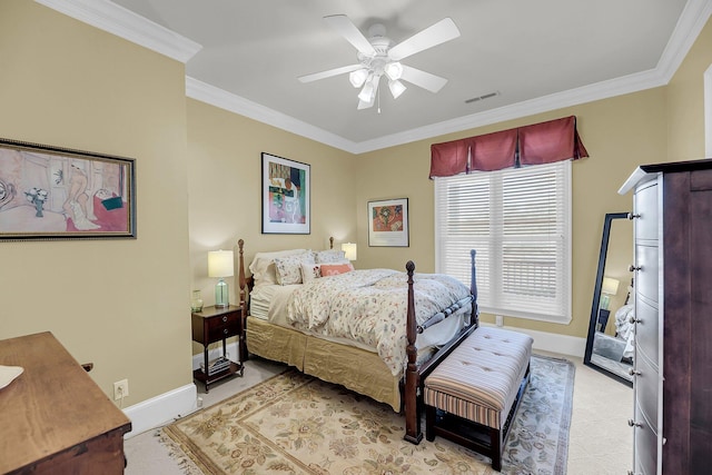 bedroom featuring visible vents, crown molding, light carpet, and baseboards